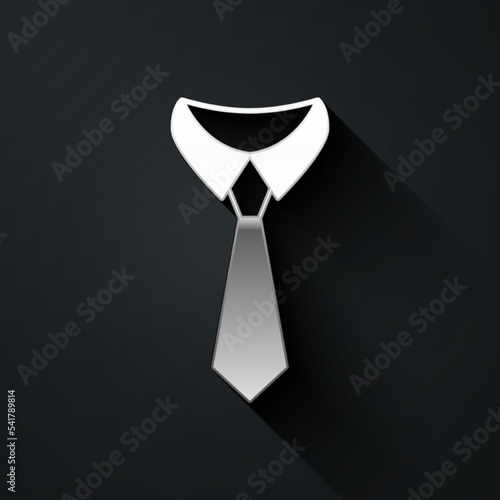 Silver Tie icon isolated on black background. Necktie and neckcloth symbol. Long shadow style. Vector