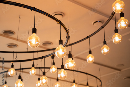energy-saving warm light lamps fixed under the ceiling	
