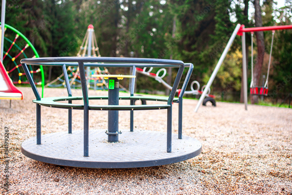 Colourful modern kids playground on the sunset. Colourful modern kids playground on the sunset.