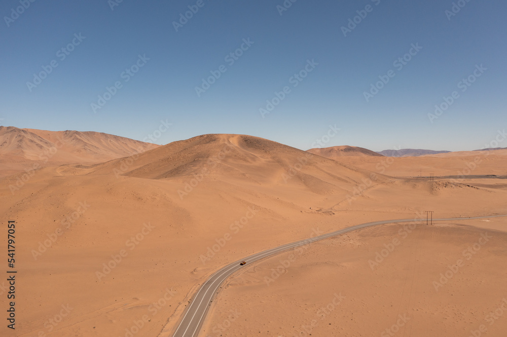 Aerial view of mountains and a road in the atacama desert near the city of Copiapó, Chile