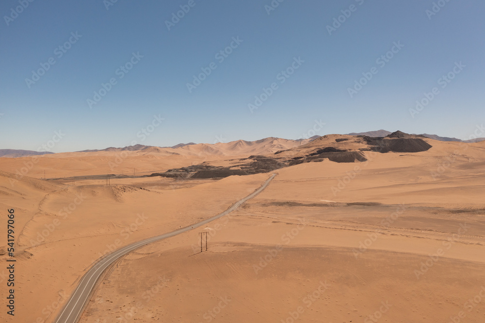 Aerial view of mountains and a road in the atacama desert near the city of Copiapó, Chile