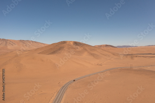Aerial view of mountains and a road in the atacama desert near the city of Copiap    Chile