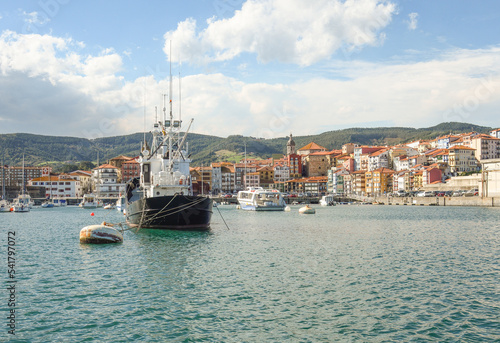 Bermeo from the port with a fishing boat in the foreground