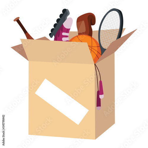 Cardboard donation box full of sports inventory. Charity and donate for poor people, help homeless and support needy. Volunteering, social care charity concept. Needed items