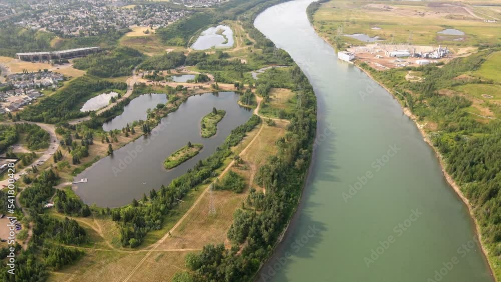 Fly through Drone shot of a Park with three ponds and a river. Part 5 Fly through Drone shot of a Park with three ponds and a river. Part 5