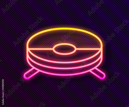 Glowing neon line Robot vacuum cleaner icon isolated on black background. Home smart appliance for automatic vacuuming, digital device for house cleaning. Vector
