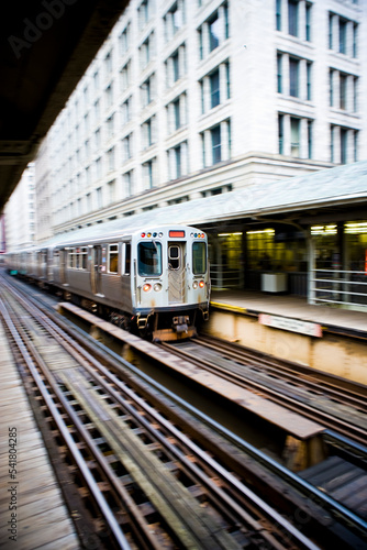 An elevated train pulls into a Loop station in Chicago, Illinois