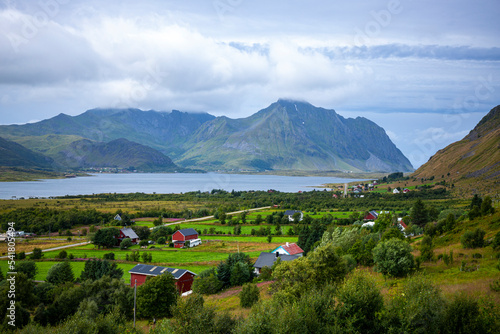 Wallpaper Mural panorama of the landscape of the lofoten islands, norway, small colourful houses on the seashore under huge rocks and cliffs, paradise beaches in rocky fjords Torontodigital.ca