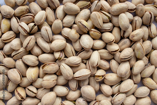 Pistachio nuts background. Close up of pistachio nuts. Top view