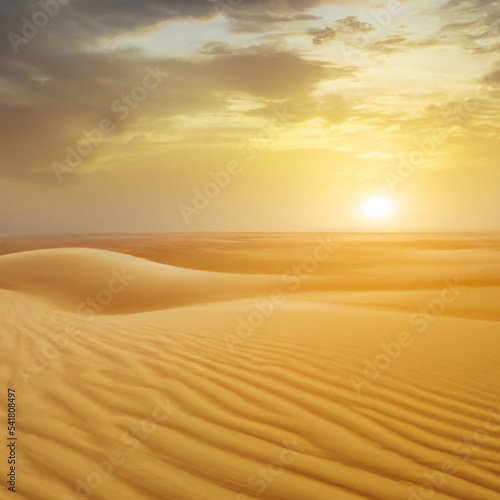 Desert sand dunes with hazy cloudy sky and sun on the horizon