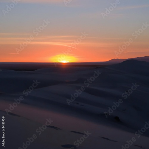 Desert sand dunes at night with sunset