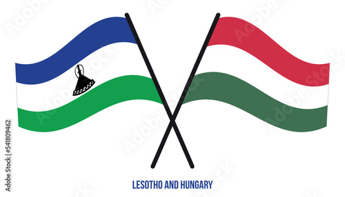 Lesotho and Hungary Flags Crossed And Waving Flat Style. Official Proportion. Correct Colors.