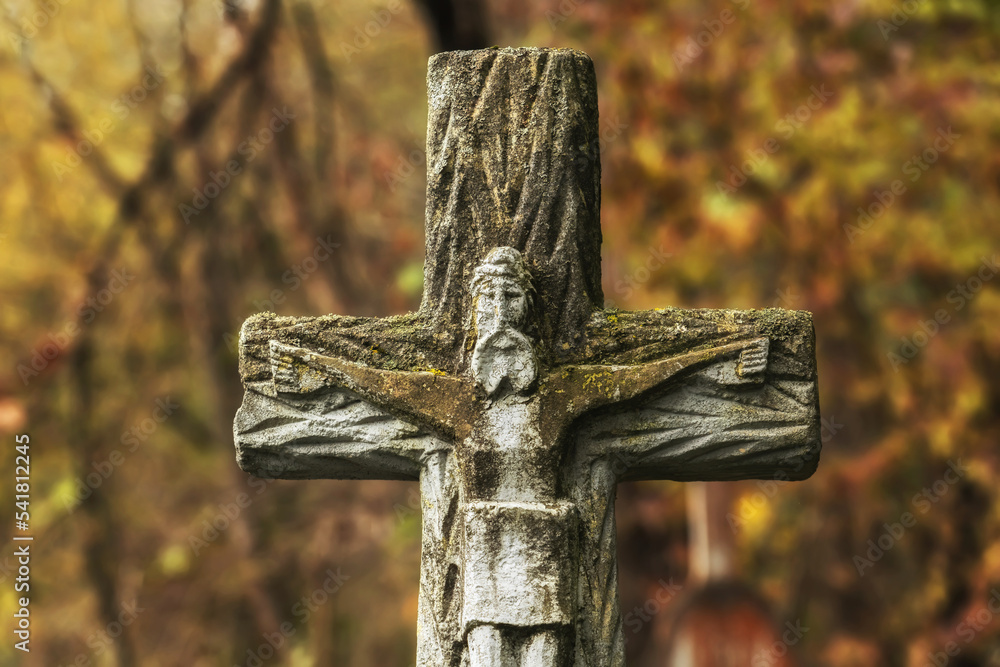 Ancient stone crucifixion of Jesus Christ on the cross. Ethnic style ...