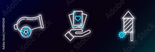 Set line Firework rocket, Cannon and Hand holding playing cards icon. Glowing neon. Vector