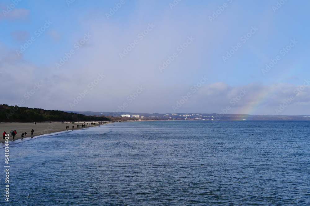 Spring rainbow on the beach
