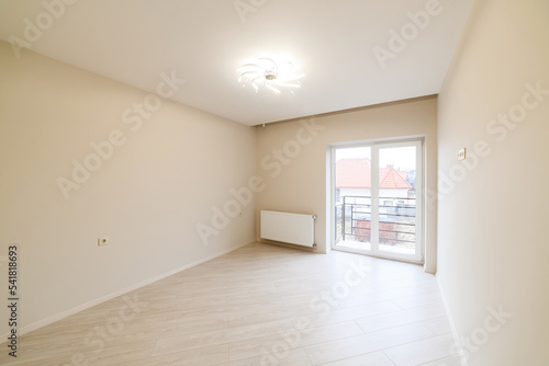 new clean bright room with wooden floor for relaxation