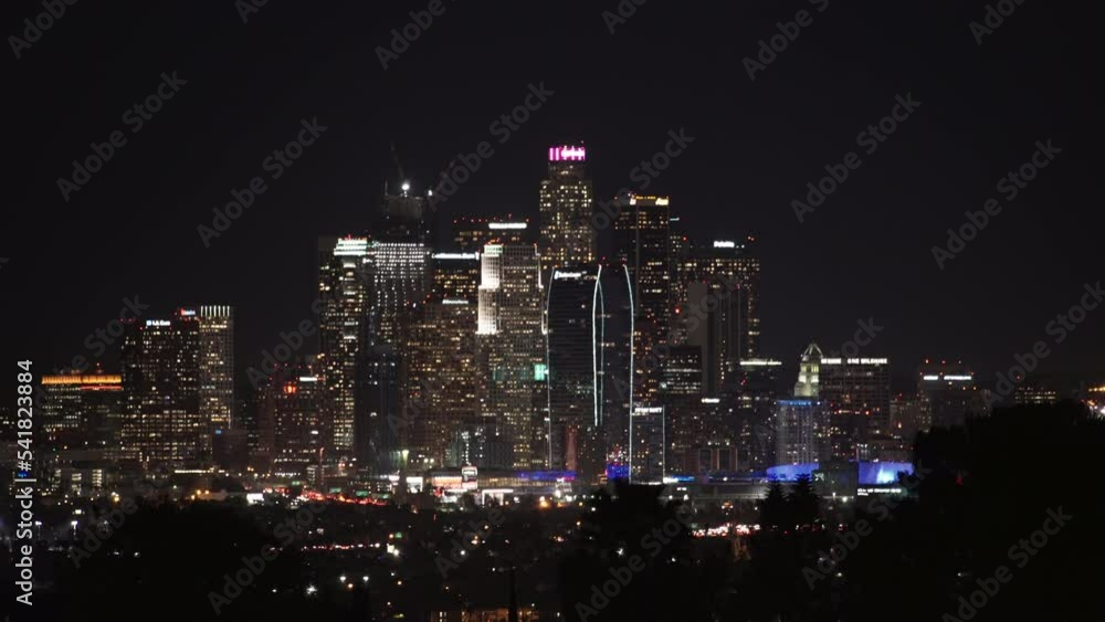 Aerial Lockdown Shot Of Illuminated Skyscrapers In Downtown Against Clear Sky At Night - Los Angeles, California Aerial Lockdown Shot Of Illuminated Skyscrapers In Downtown Against Clear Sky At Night - Los Angeles, California