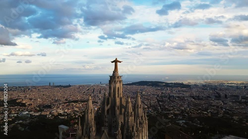 Drone shot of Tibidabo Church and Jesus statue on top. Barcelona 2 October 2022 photo