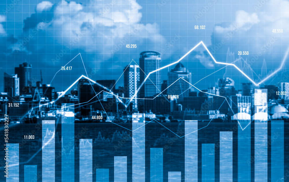 As background for a financial or business concept, digital screen and financial graphs overlap
