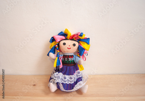 mexican indigenous lele doll on white background