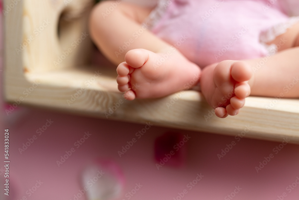 the legs of the newborn baby. the legs of the newborn flaky skin. peel