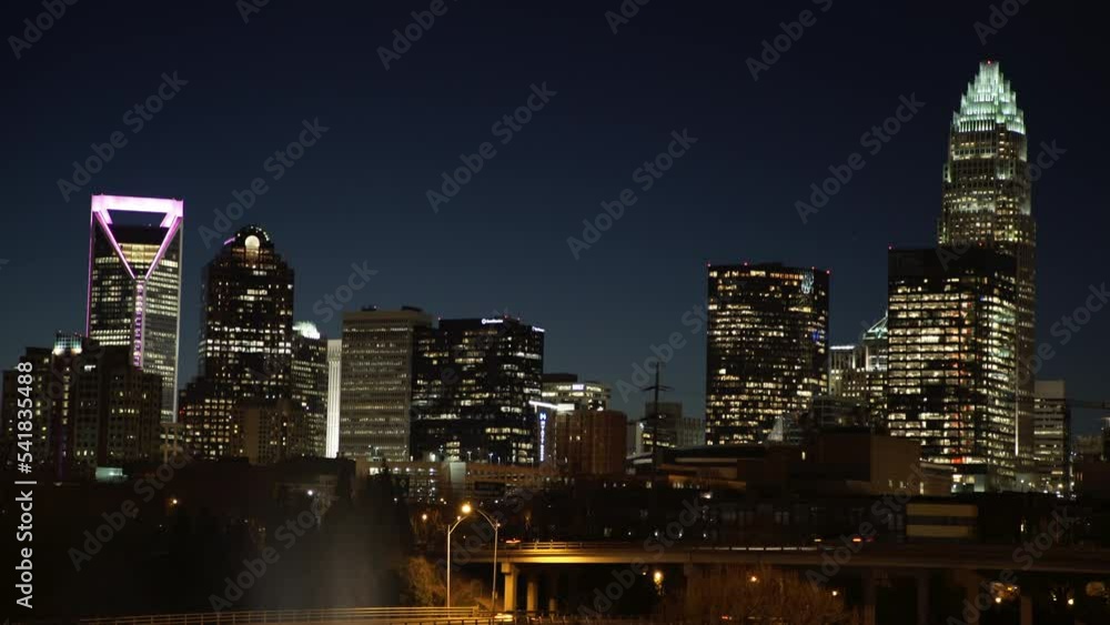 Lockdown Shot Of Illuminated Modern Buildings In Downtown Against Clear Sky At Night - Charlotte, North Carolina Lockdown Shot Of Illuminated Modern Buildings In Downtown Against Clear Sky At Night - Charlotte, North Carolina