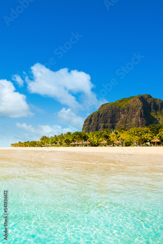 Fototapeta Naklejka Na Ścianę i Meble -  Tropical beach on the shore of Indian Ocean near Le Morne Brabant mountain, Mauritius