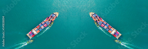 Aerial view of sea freight, Cargo ship, Cargo container in factory harbor at industrial estate for import export around in the world, Trade Port / Shipping - cargo to harbor © AU USAnakul+