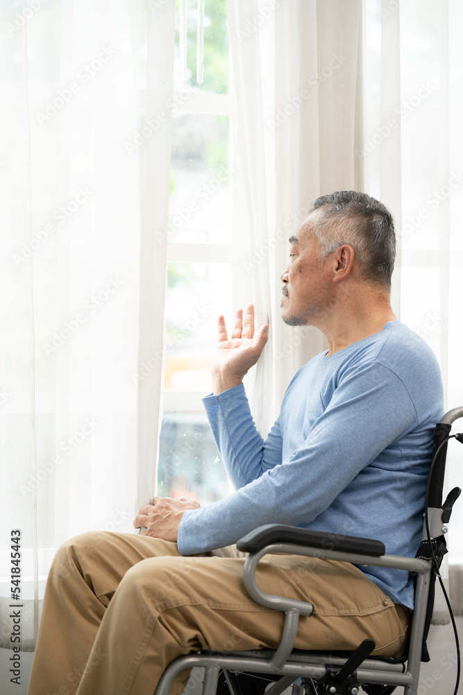 senior man sit in wheelchair look in distance feel lonely, thoughtful sad mature man in wheel chair thinking. suffering from loneliness, thinking of future. senior man sit in wheelchair look in distance feel lonely, thoughtful sad mature man in wheel chair thinking. suffering from loneliness, thinking of future.