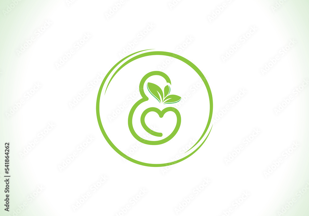 Fototapeta premium Love healthy and green nutrition leaf logo design with the letters. Green love leaf logo