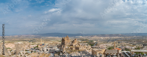 Panoramic aerial view of the mountains and stone buildings in Cappadocia, Turkey photo