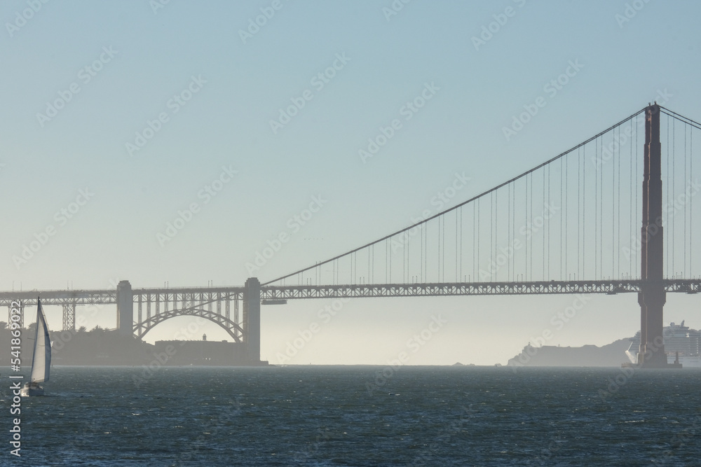 Panoramic scenic aerial view over San Francisco Bay Area with Golden Gate Bridge, downtown skyline cityscape and Alcatraz island sailing boats yachts harbor landmark sights Tower scenery Panoramic scenic aerial view over San Francisco Bay Area with Golden Gate Bridge, downtown skyline cityscape and Alcatraz island sailing boats yachts harbor landmark sights Tower scenery