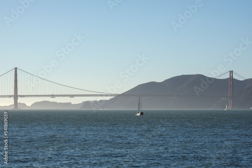 Panoramic scenic aerial view over San Francisco Bay Area with Golden Gate Bridge  downtown skyline cityscape and Alcatraz island sailing boats yachts harbor landmark sights Tower scenery