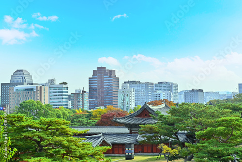 Autumn of Korean tradition architectural of Changgyeonggung Palace and modern building cityscpae modern office view background, Seoul, Republic of Korea photo