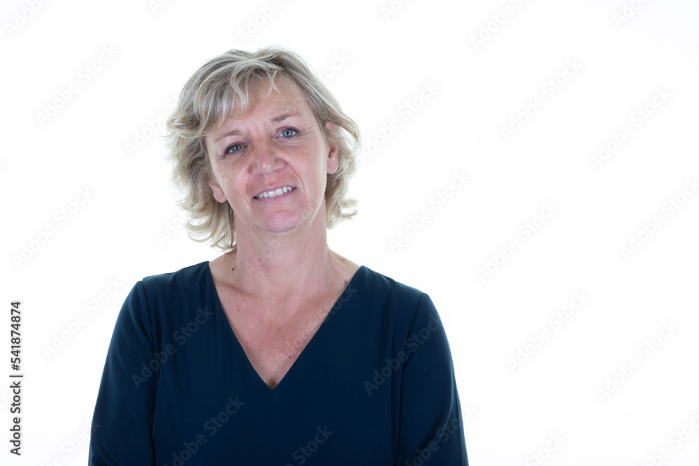 pretty beautiful senior smiling happy woman mature in blue dress over white background pretty beautiful senior smiling happy woman mature in blue dress over white background