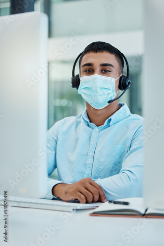 Covid, call center agent or customer service consultant with computer desktop for policy, compliance or insurance IT support. Telemarketing, virtual advisor man portrait consulting with a face mask