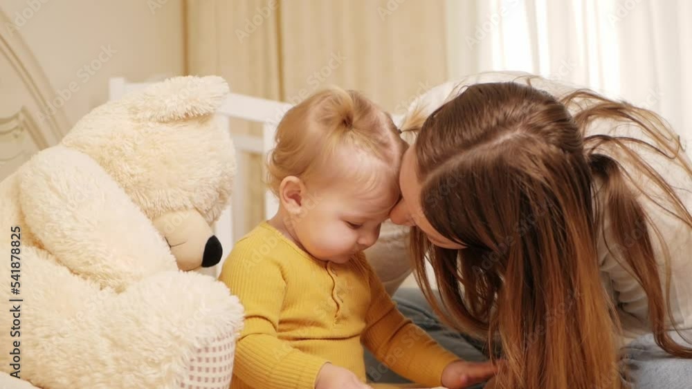 Mother and daughter play together, learn, home room, fun, love and care. Funny Mother and daughter play together, learn, home room, fun, love and care. Funny