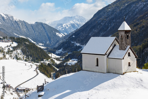 Small chapel in a winter landscape view in the alps © Lars Johansson