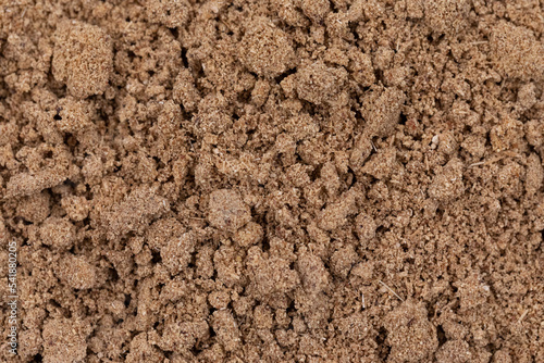 background of fertilized soil with organic compost