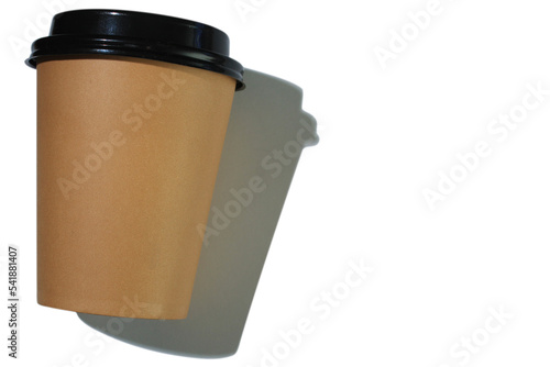 Cardboard coffee cup with plastic lid with hard shadow on white background. isolated object. Template with copy space. The concept of ecology, recycling, environmental protection
