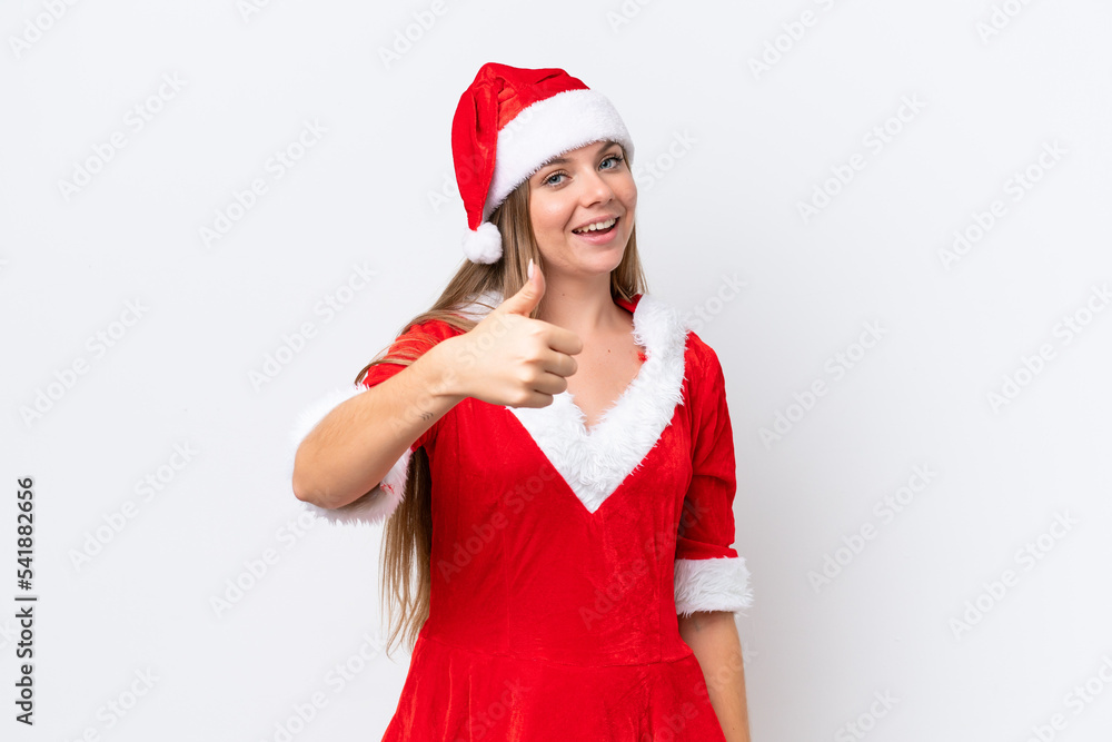 Young caucasian woman dressed as mama noel isolated on white background with thumbs up because something good has happened Young caucasian woman dressed as mama noel isolated on white background with thumbs up because something good has happened