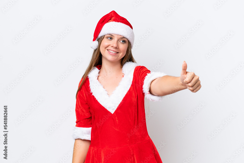 Young caucasian woman dressed as mama noel isolated on white background giving a thumbs up gesture Young caucasian woman dressed as mama noel isolated on white background giving a thumbs up gesture