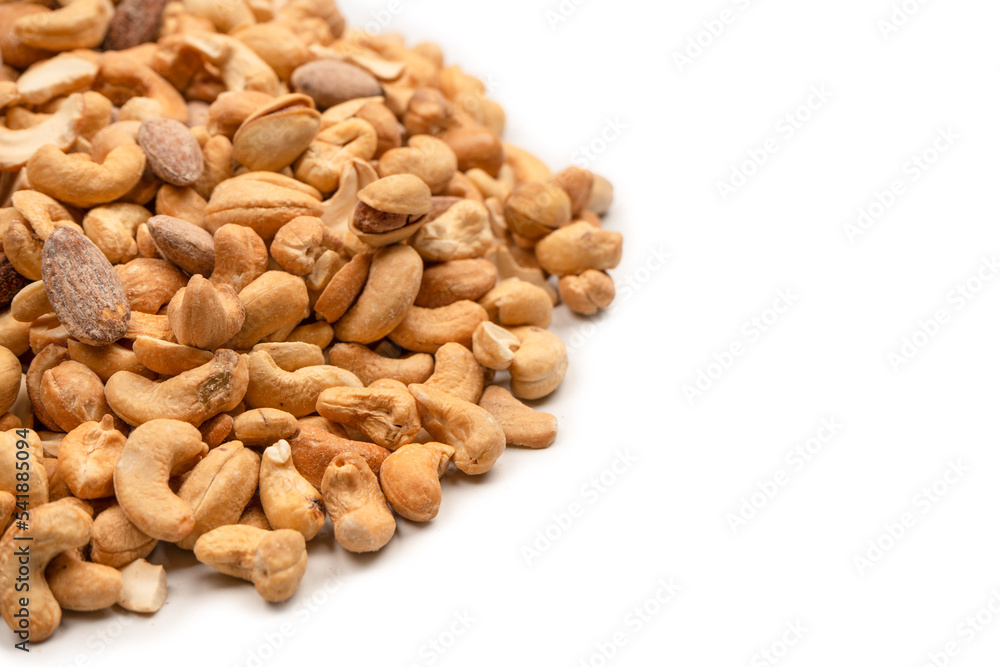 A group of almonds, pistachios, walnuts, macadamia, cashews. A group of almonds, pistachios, walnuts, macadamia, cashews.