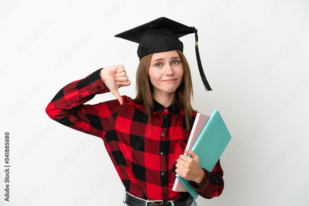 Young English student woman isolated on white background showing thumb down with negative expression Young English student woman isolated on white background showing thumb down with negative expression