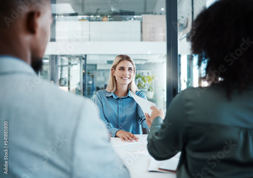 Recruitment, job interview or business people in meeting for hiring, feedback or documents review in office. Happy, smile or HR women with paper for contract sign, consulting or startup teamwork