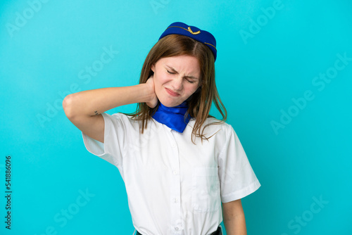 Airplane stewardess English woman isolated on blue background with neckache