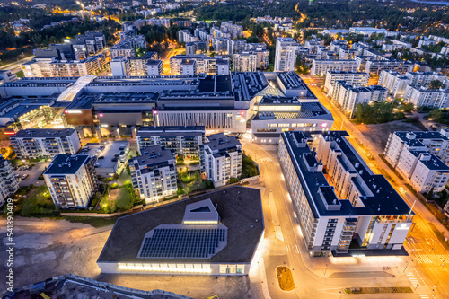 Aerial view of the Matinkyla neighborhood of Espoo, Finland. Modern Nordic Architecture. Solar panels on the roof building.