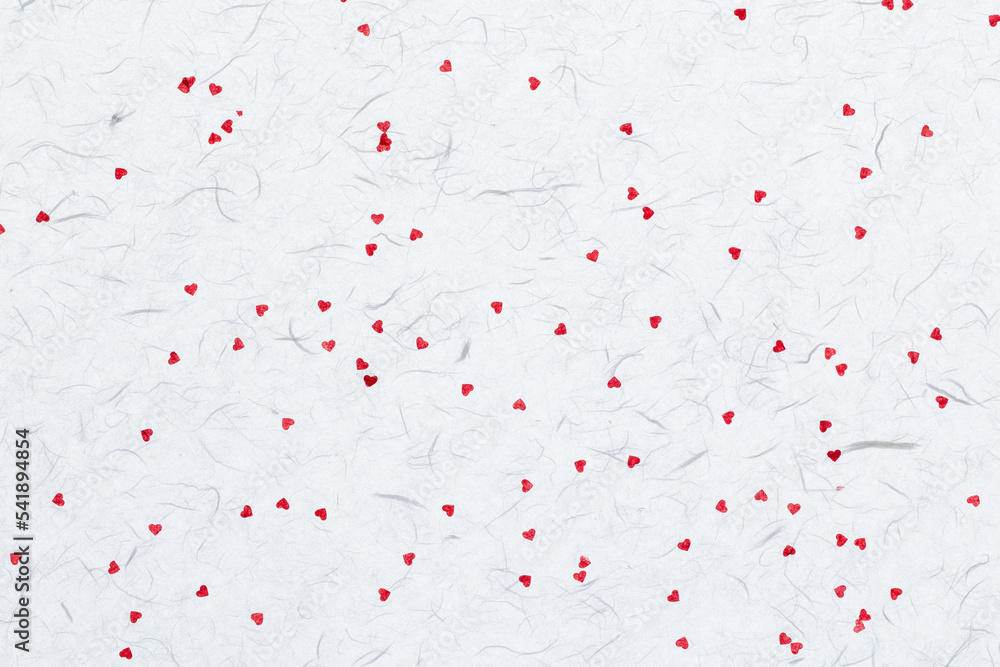mulberry paper with red hearts. valentine background