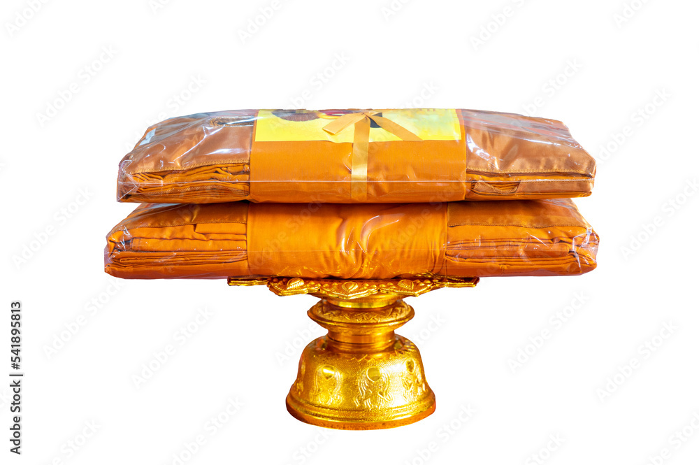 set of monk’s robes placed on a pedestal Isolate on transparent