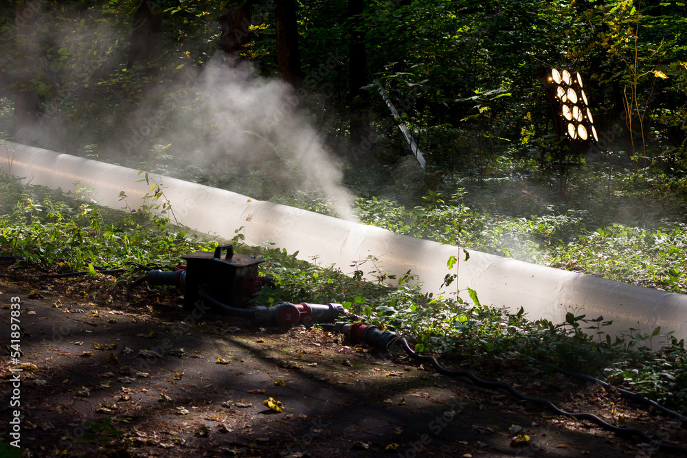 Spraying theatrical smoke in nature during the shooting of the film, cinema smoke machine Spraying theatrical smoke in nature during the shooting of the film, cinema smoke machine